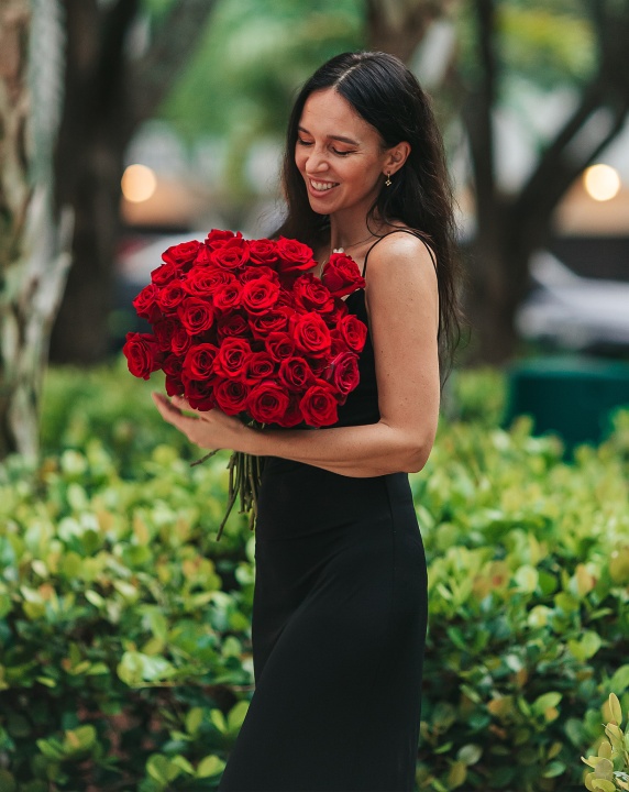 Woman with 50 roses